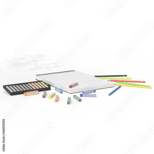 Blank spiral sketchbook surrounded by colorful pencils, pastel chalks, and pencil sharpeners on a white background. Artistic workspace concept. Suitable for drawing, sketching, creative design, educat