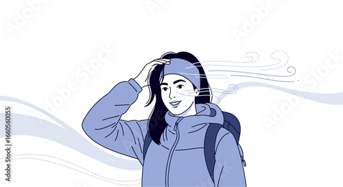 Adventure Seeker Enjoying Windy Conditions While Hiking On A Fresh Day