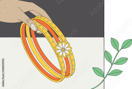 Hand holding decorative gold bangles with flower design