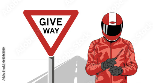 Biker Alongside Road Sign Awaiting Instructions At An Intersection Ahead