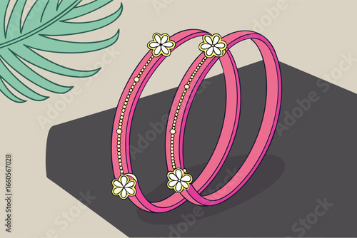 Two Pink Bangles with Floral Embellishments on a Surface