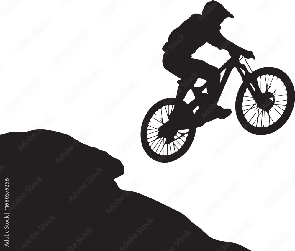 Obraz premium Mountain biker jumping from rock formation silhouette