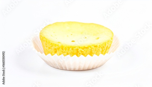 Mini cheesecake on paper liner isolated on white background with full depth of field for dessert or party snack concept