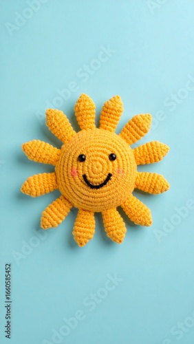 Knitted sun toy against a backdrop