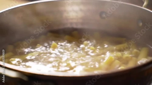 Rigatoni Pasta Boiling In Hot Water Bubbles Cooking Preparation