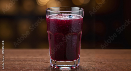 Wallpaper Mural Blueberry juice in a glass on wooden table with blurred background   Torontodigital.ca