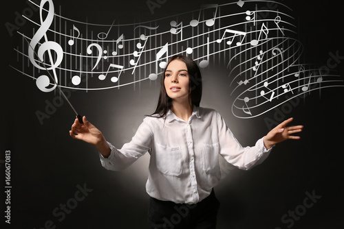 Young female conductor on d...