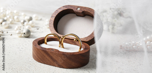 Wedding rings in wooden box...