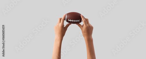 Child with small rugby ball...