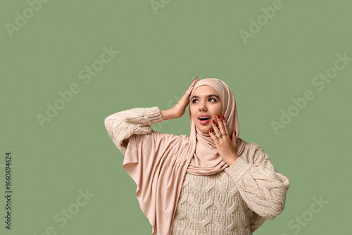Shocked young Muslim woman ...