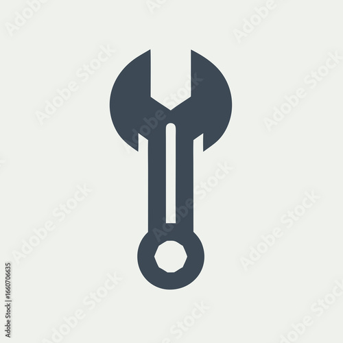 Dark Grey Wrench Tool Icon for Repair and Maintenance.