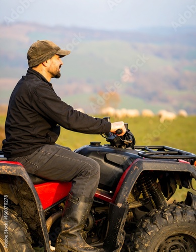 Man driving ATV in rural landscape