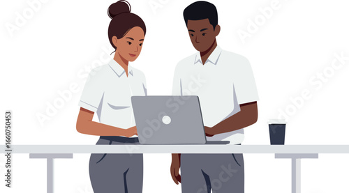 Two colleagues working together on laptop in office environment teamwork collaboration 