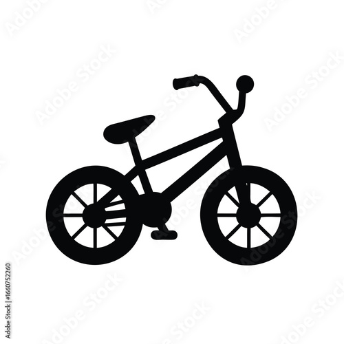 Black silhouette illustration of a kid's bicycle on a white background