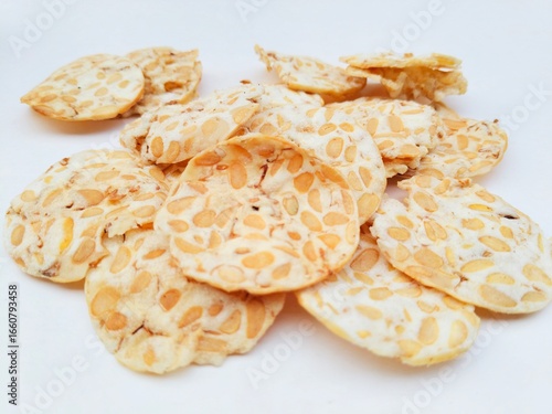 Photos Tempeh chips on a white background.