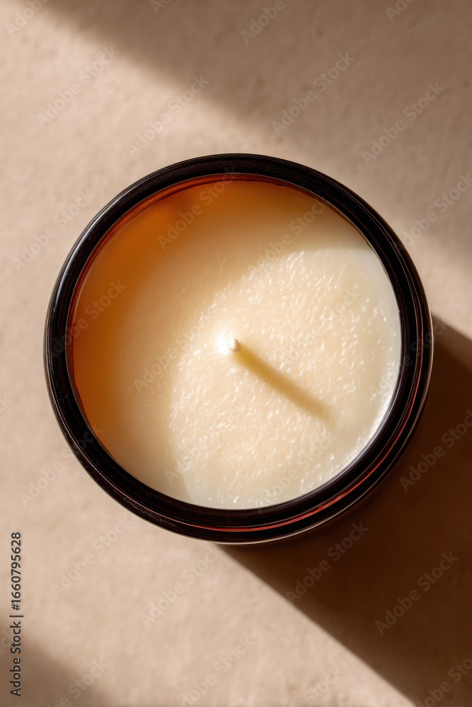 Close-Up of a Relaxing Candle with Soft Natural Light and Warm Shadows for a Cozy Atmosphere Close-Up of a Relaxing Candle with Soft Natural Light and Warm Shadows for a Cozy Atmosphere