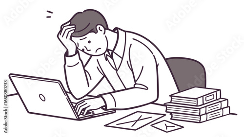 Frustrated businessman working on laptop with piles of books.