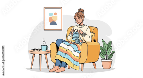 Woman cozily knitting in armchair, wrapped in blanket, enjoying a warm drink.