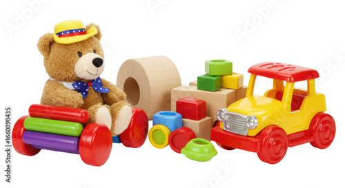 Colorful childrens toys including a teddy bear blocks and vehicles isolated on white background in a playful setting