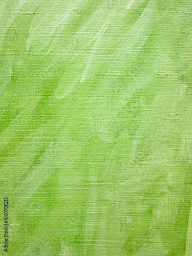 Vibrant green textured background showcasing subtle brush strokes and layers of color