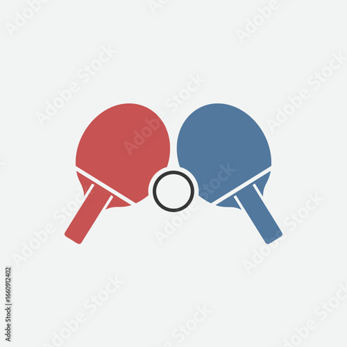 Two ping pong paddles and ball on a light background