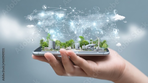 Hand holding a phone displaying a miniature city with world map overlay