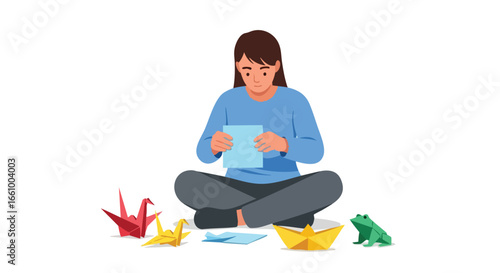 Focused young woman creating origami figures in a relaxed posture enjoying her hobby while promoting mindful activity and creative thinking