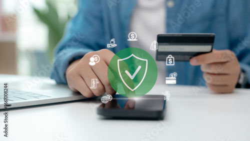 Secure online payment concept with credit card and digital security shield icon. Safe e-commerce transaction, fintech protection, cyber security and online banking technology.