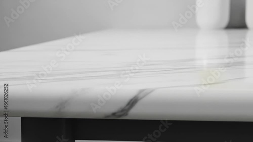 Elegant marble countertop video showcasing smooth surface with light reflections, sleek and modern