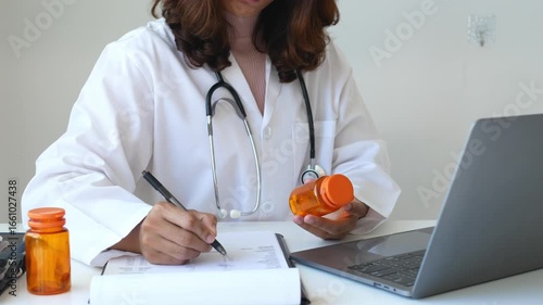A female doctor reviews test results and diagnoses disease, records, prescribes medicine, and provides explanations. Recommend the use of medication Medical and wellness concept.	