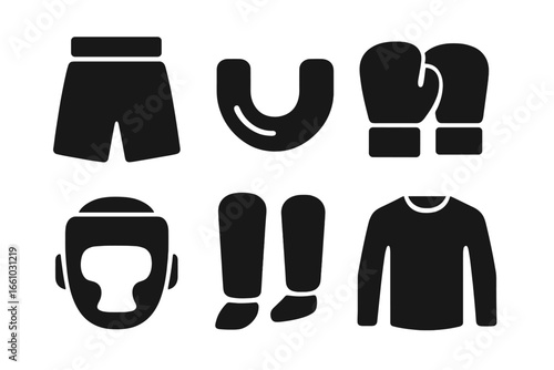 Fight gear solid icon set. Martial arts equipment glyphs. Boxing gloves, headgear, mouthguard, shorts, shin guards. MMA, kickboxing combat sport vector illustration.