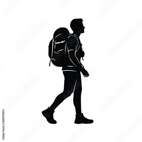 Silhouette of a man hiking with a large backpack walking towards the right side of the frame view