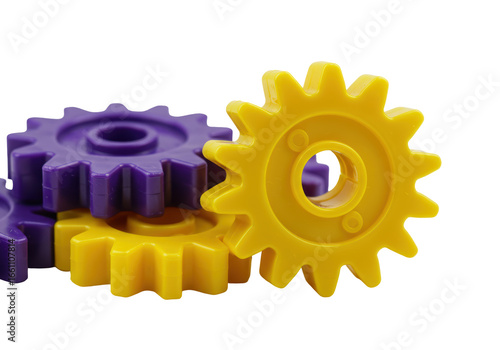 Isolated Cluster of Interlocking Yellow and Purple Plastic Toy Gears
