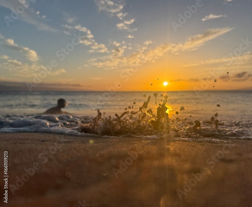 Sunset Ocean Waves Splash on Beach Shore