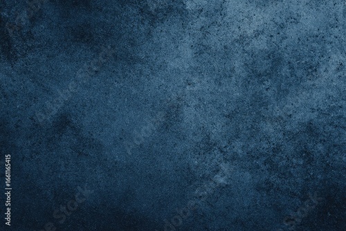 Dark, textured, indigo-hued surface with subtle variations in tone