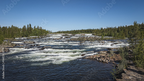 A wide river that plunges down like a waterfall.