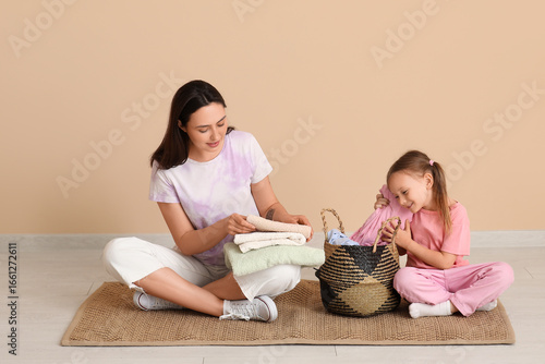 Young woman and her daughte...