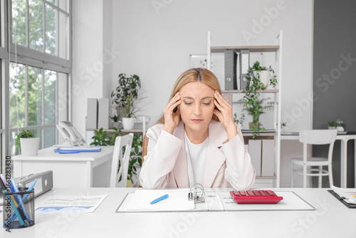 Tired female accountant wor...
