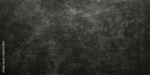 Dark vintage grunge wall texture with a black aged concrete surface background