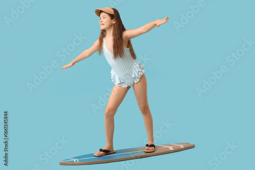 Cute girl in swimsuit on su...