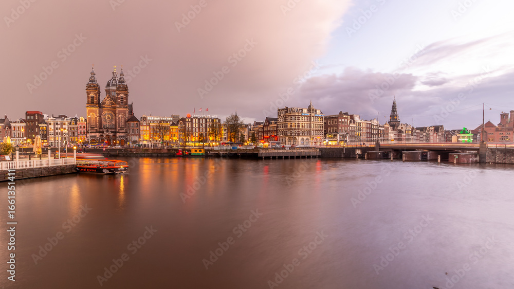 Obraz premium Amsterdam canal at night in Holland on june 10th 2025