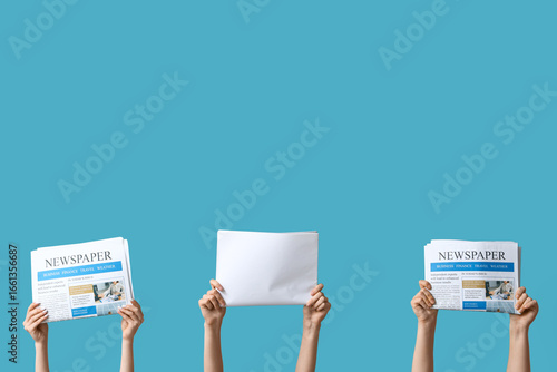 Female hands with newspaper...
