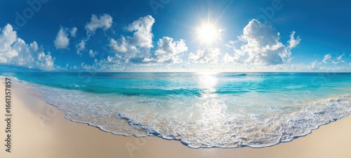 Fototapeta Naklejka Na Ścianę i Meble -  The breathtaking beach view under a radiant sun and clear blue skies.