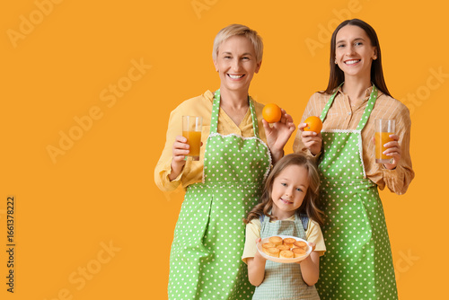 Happy family with orange ju...