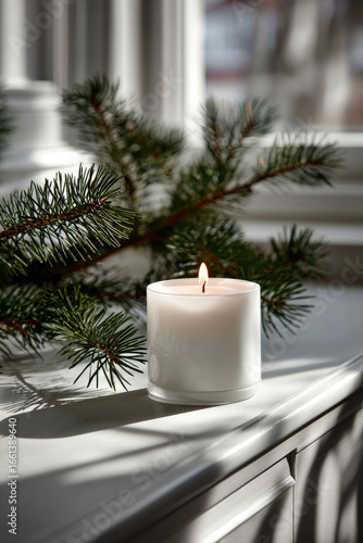 soft candlelight casts gentle rays on pristine white wall creating peaceful ambiance
