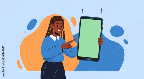 Smiling Black woman points to a smartphone with a green screen, ideal for showcasing mobile apps, services, or online content for business and lifestyle.