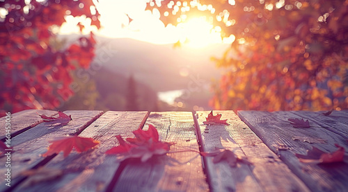 autumn leaves on wooden background