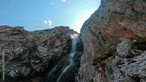 Waterfall between cliffs