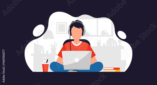 Young person wearing headphones works remotely on laptop in a comfortable home setting. Ideal for online learning, remote work, or digital lifestyle concepts.
