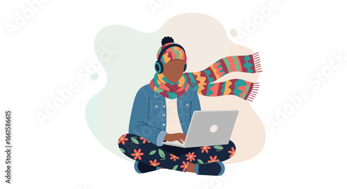 Cozy person in colorful winter hat and scarf, wearing headphones, working on laptop. Represents remote work, online learning, and comfort.